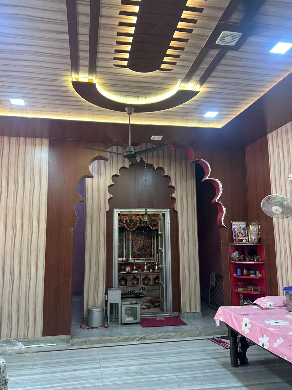 Grand pooja room entrance with multi-foil archway